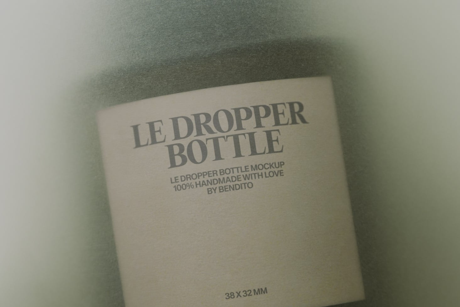 Cream colored dropper bottle mockup with gray text on soft textured background
