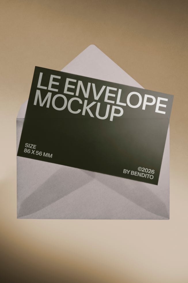 Dark card poking out of white envelope on tan background, minimal styling