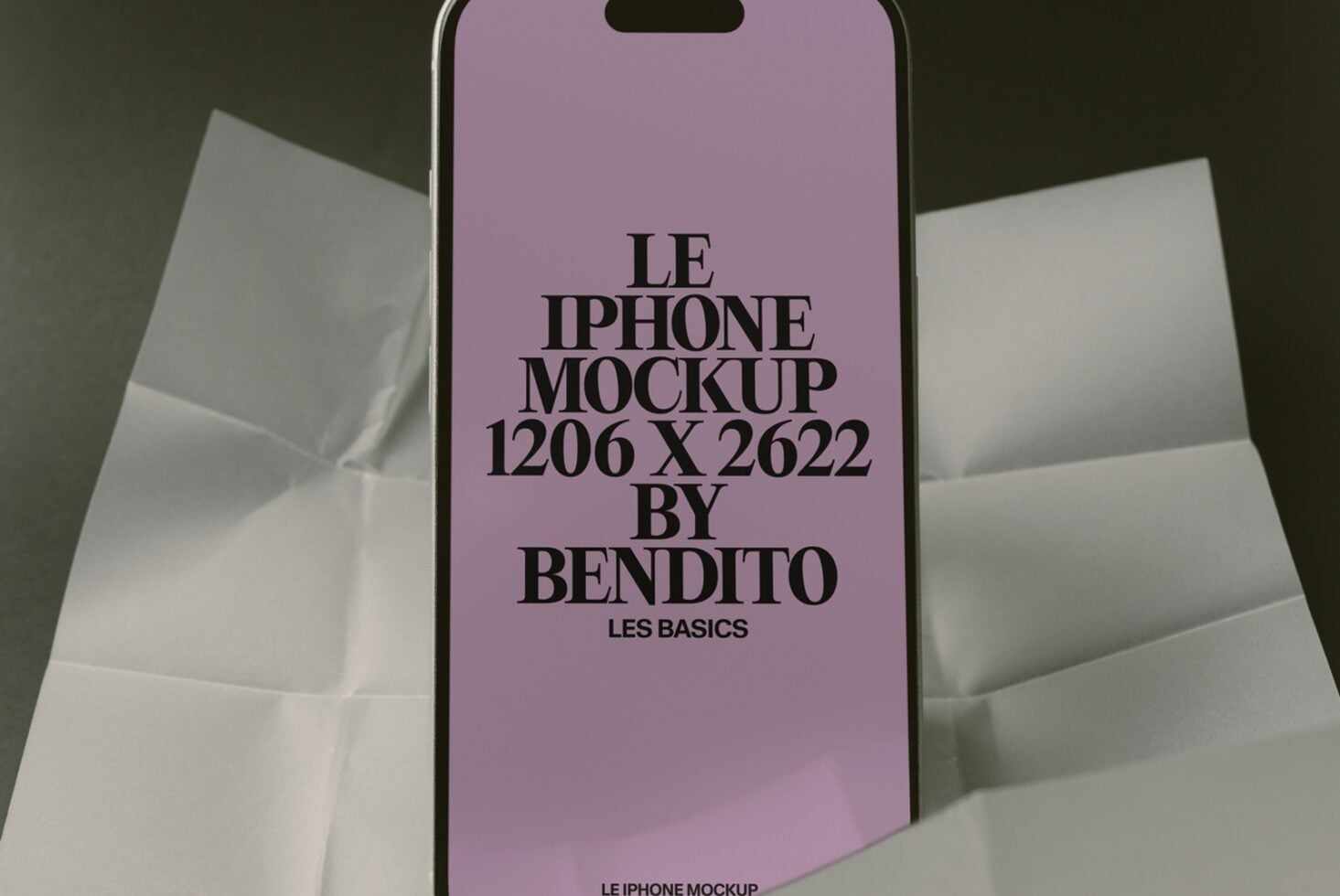 iPhone mockup with lavender screen on folded paper background, ready for your design work