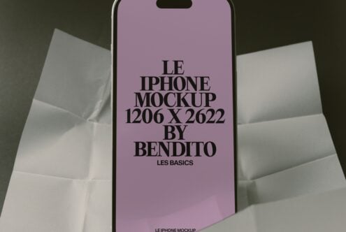 iPhone mockup with lavender screen on folded paper background, ready for your design work
