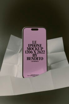 iPhone 14 Pro mockup with lavender screen on crumpled white paper, dark background