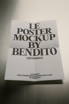 Folded poster mockup with serif typography displaying "Le Poster Mockup by Bendito" branding on textured background