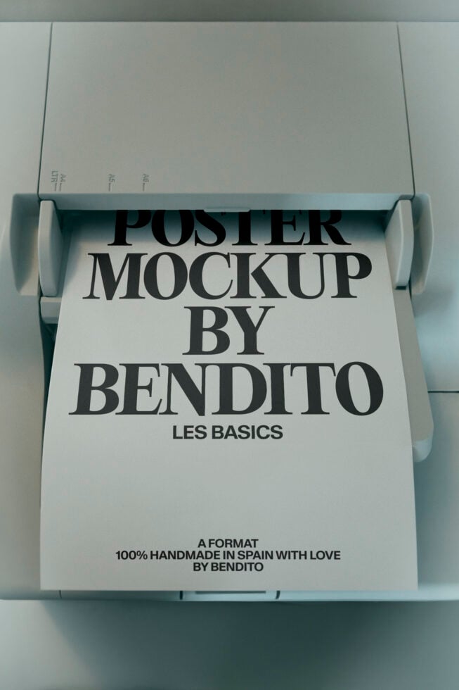 Rolled poster mockup in white tube with gray end caps, showing bold serif typography layout on cream paper