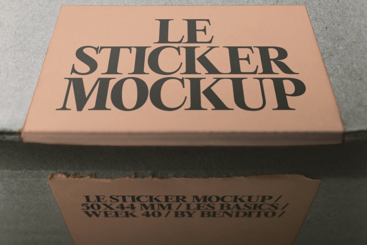 Peach sticker mockup on kraft box with serif lettering, top view