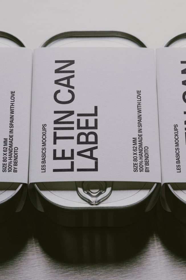 Tin can mockup with olive green handles showing label design template