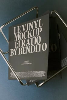 Vinyl record sleeve mockup in 1:1 ratio lying flat with chrome handles on blue background