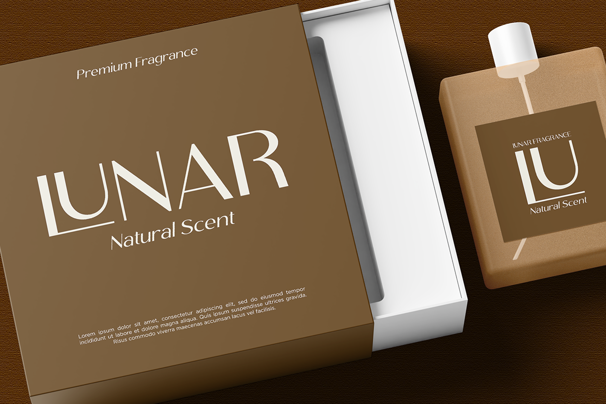 Lunar fragrance box mockup with matching bottle, tan minimal branding on wood surface