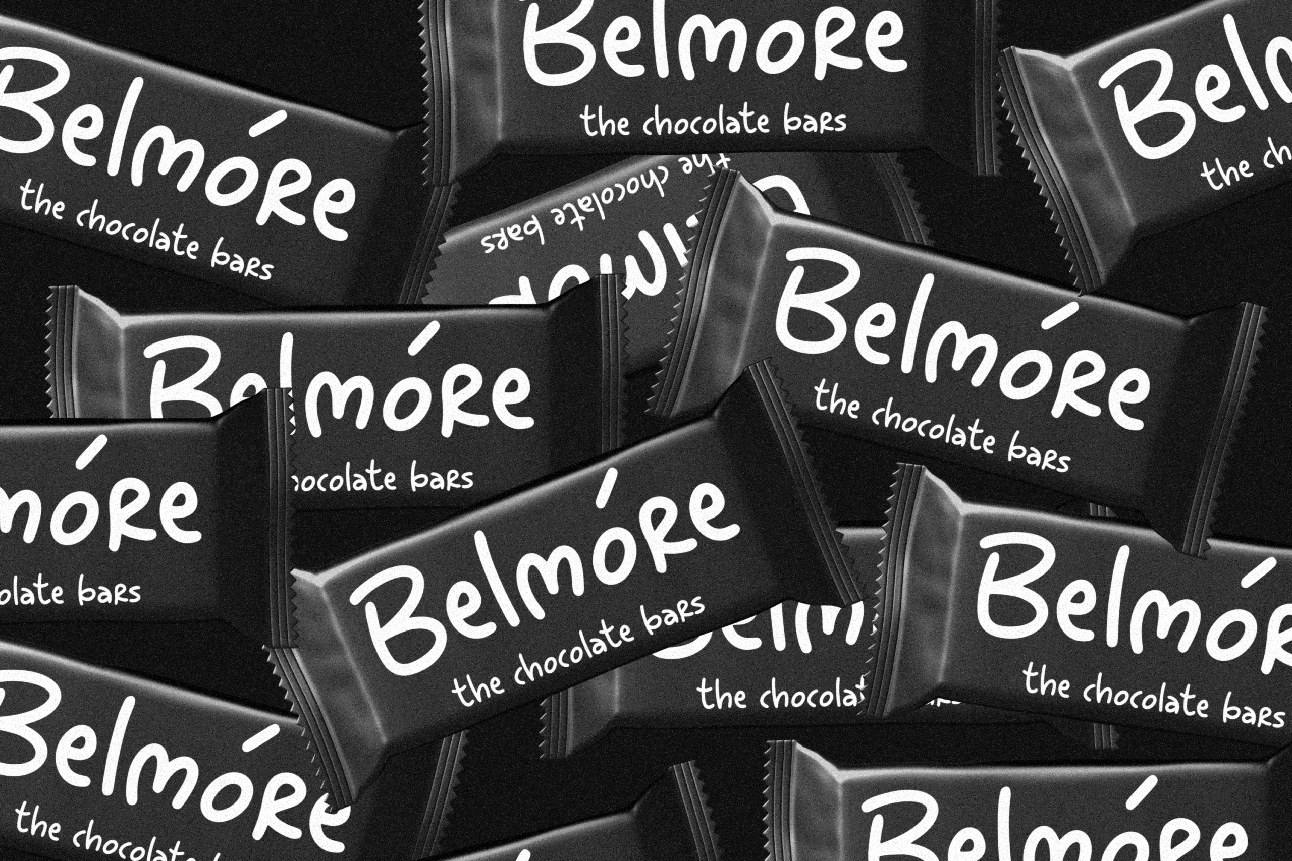 Belmore chocolate bar wrapper mockup with black packaging, white handwritten-style branding text scattered across dark surface