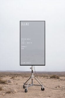 Mobile billboard mockup on tripod stand in desert landscape