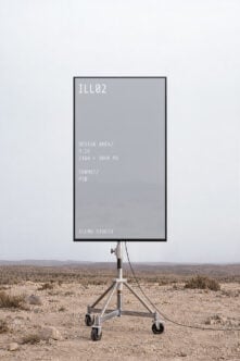 Mobile phone mockup on tripod stand in desert landscape