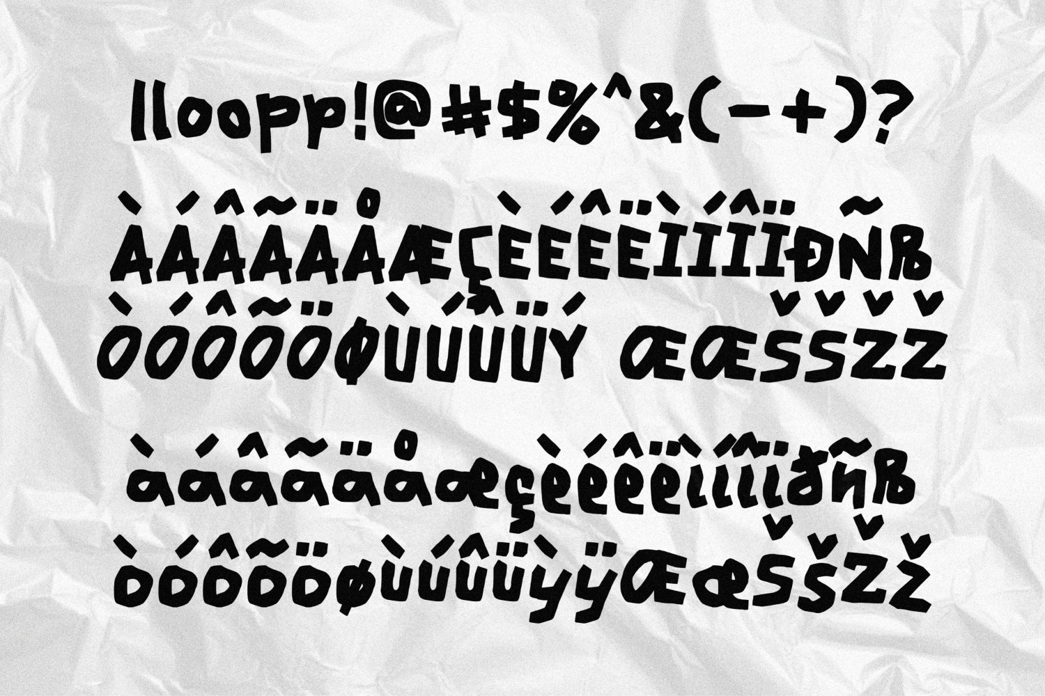 Bold sans serif font with complete character set showing accents, symbols, ligatures on crumpled paper background