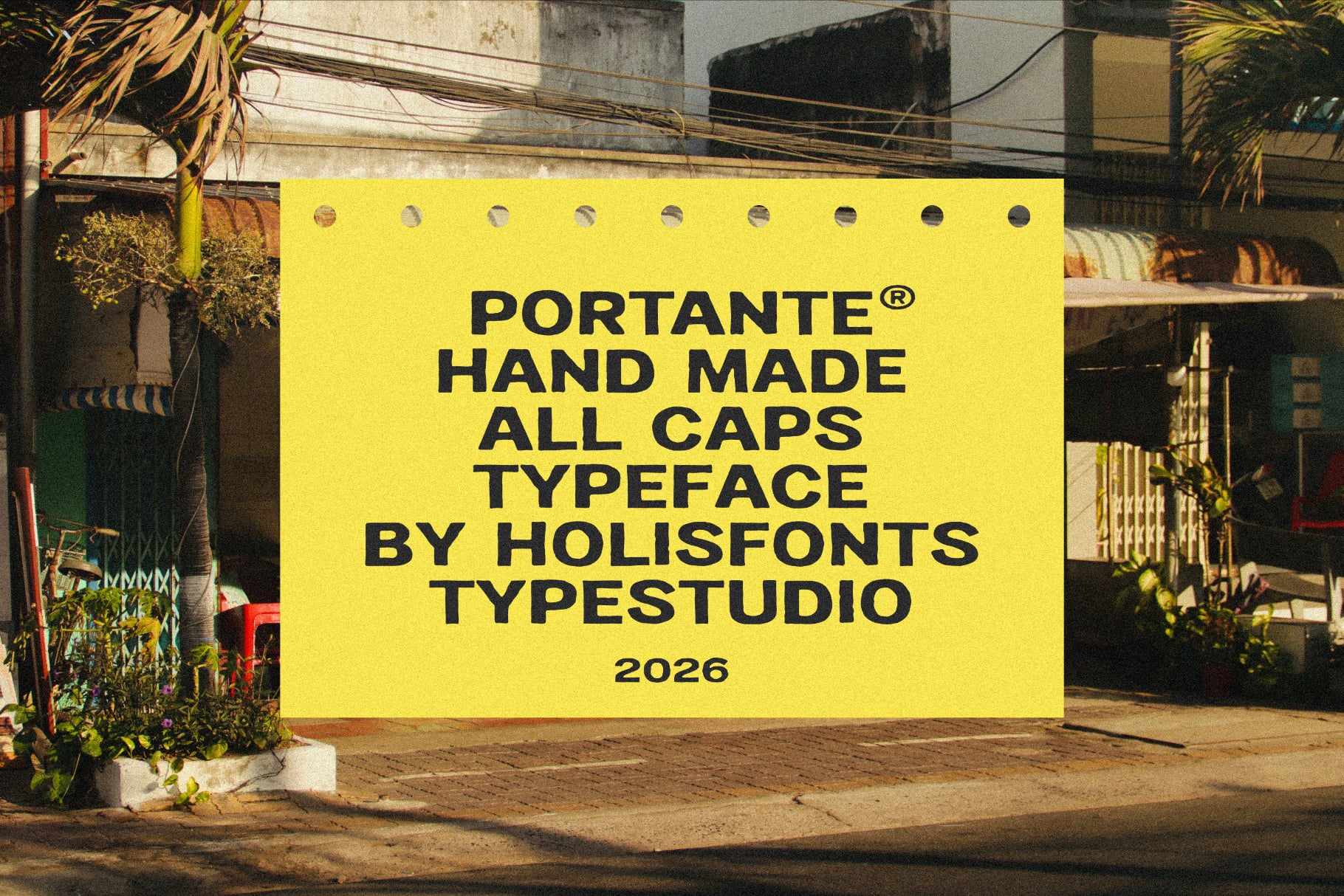 Bright yellow billboard mockup with bold black text on urban street scene