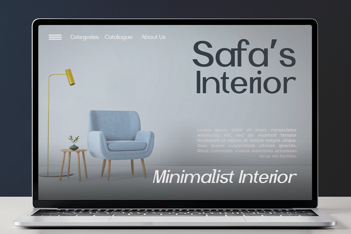 Minimalist interior website mockup with blue armchair, side table, brass lamp on laptop screen