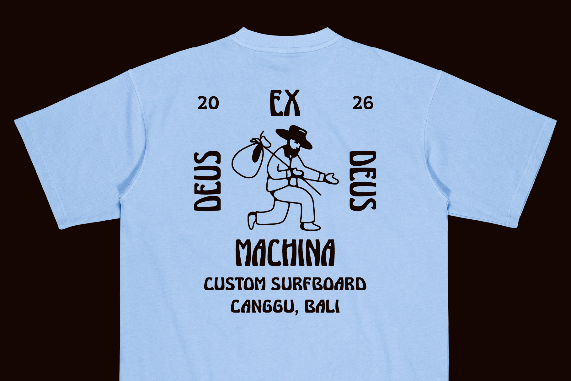 Light blue tee with cowboy lasso graphic, deus ex machina surfboard shop canggu bali back print