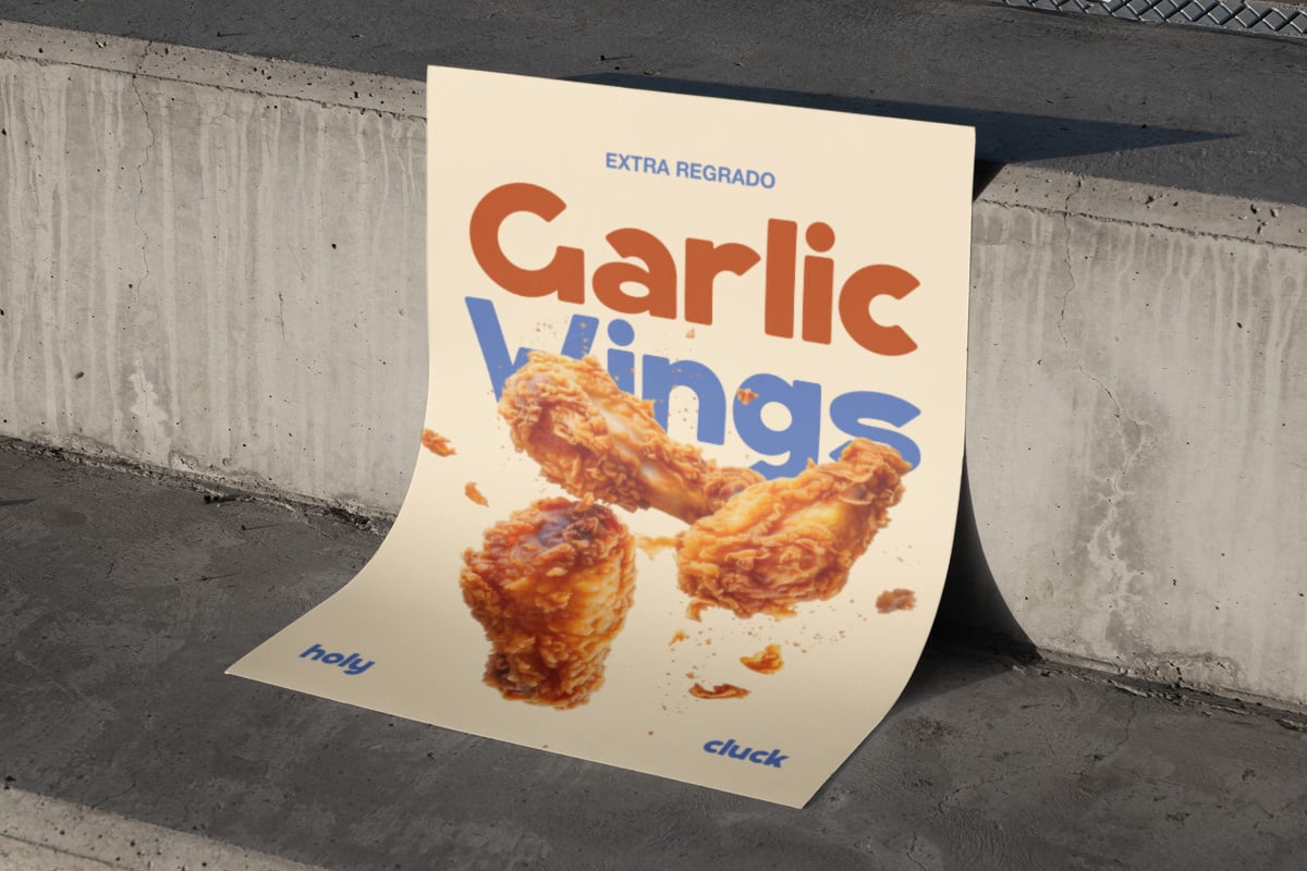 Folded food packaging mockup showing crispy garlic wings box in concrete setting