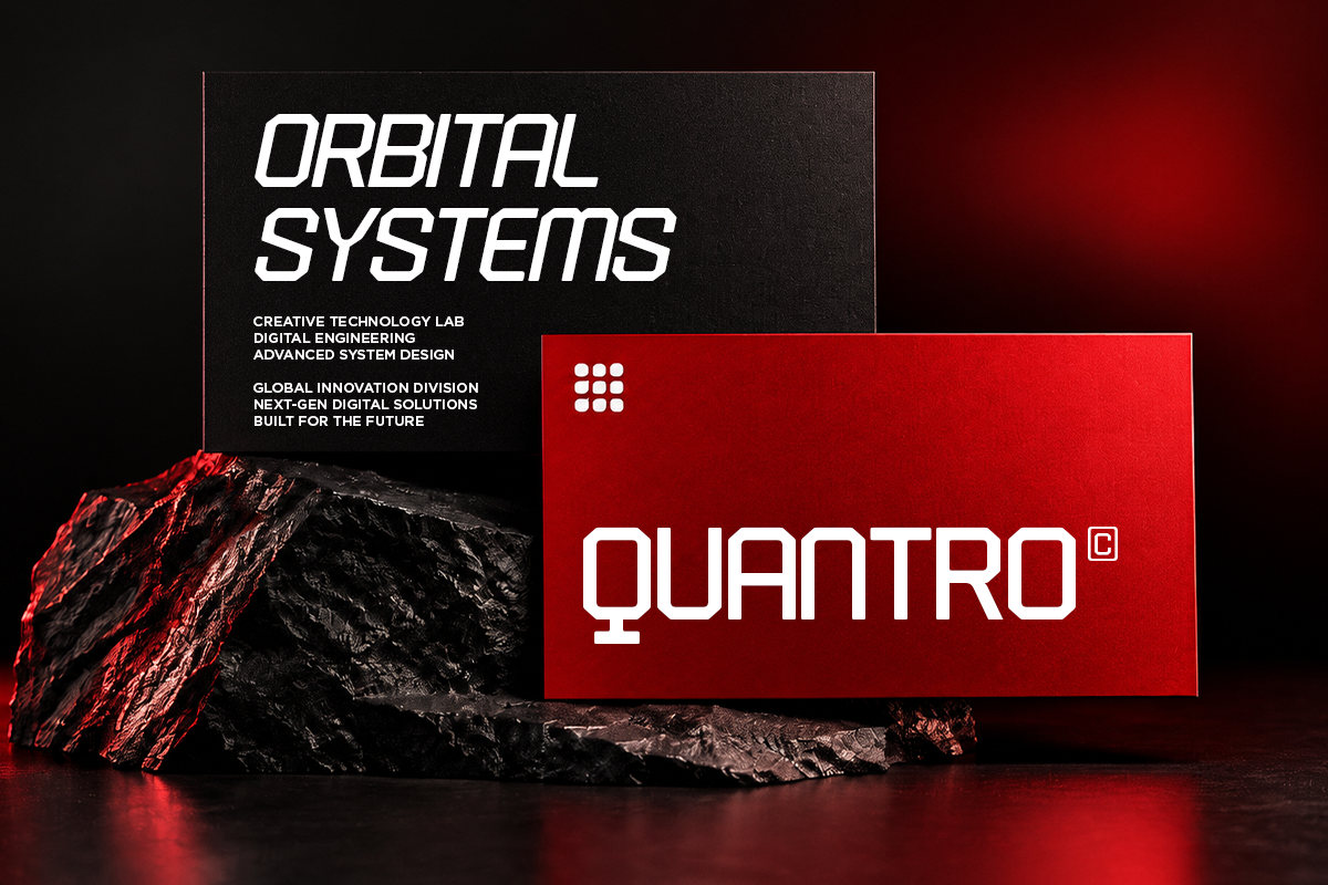 Bold red card mockup with white sans-serif logo overlaid on dark tech aesthetic with textured rock elements