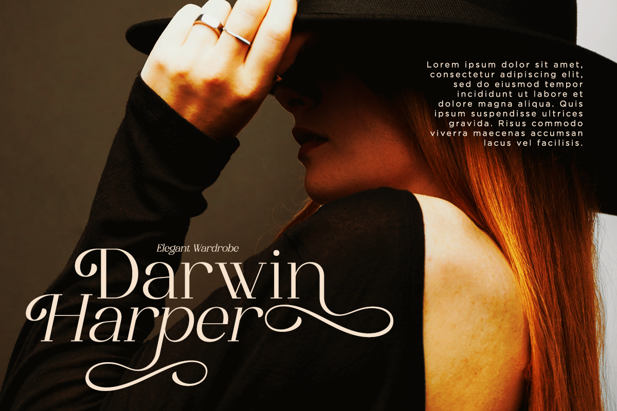 Woman with copper hair in dramatic lighting wearing elegant serif font overlay reading Darwin Harper