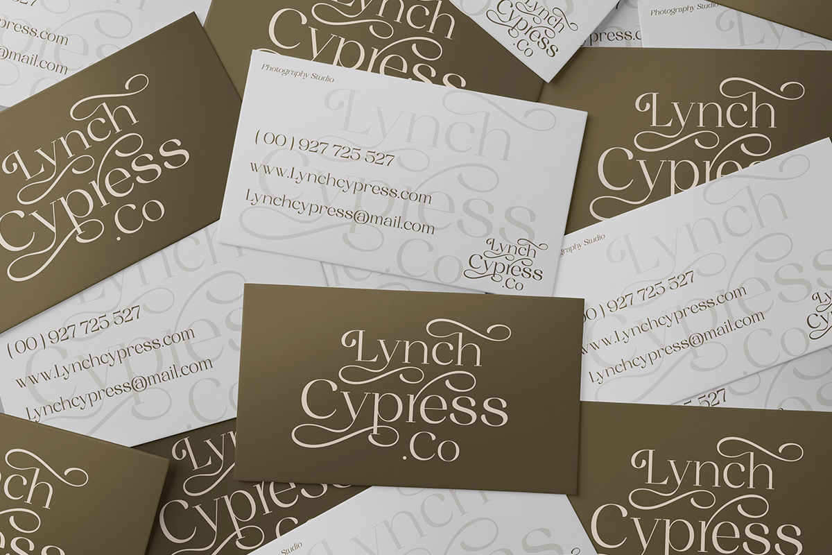 Lynch Cypress Co business card mockup with elegant serif branding on olive brown cream cards