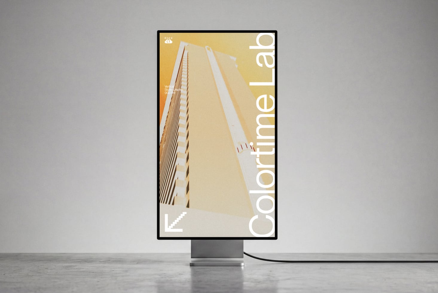 Vertical monitor mockup showing minimalist yellow poster with geometric architecture photo