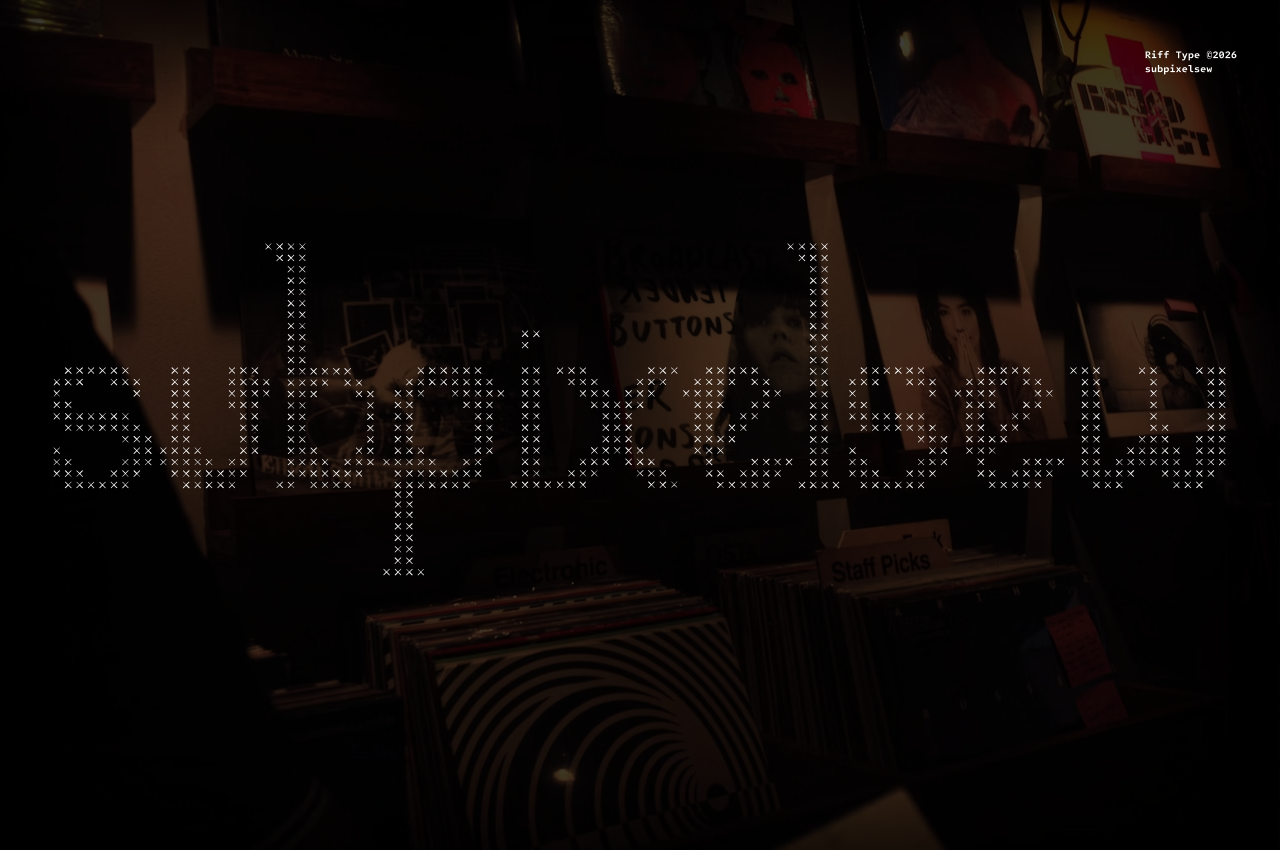 Retro city skyline made of X characters overlaid on moody vintage shop interior scene