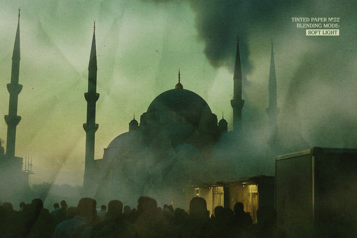 Moody mosque silhouette emerging from thick fog with crowd below, soft light blending mode overlay