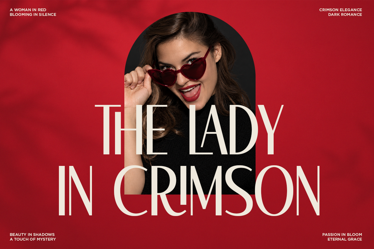 Woman in heart-shaped sunglasses with bold red lips on crimson background