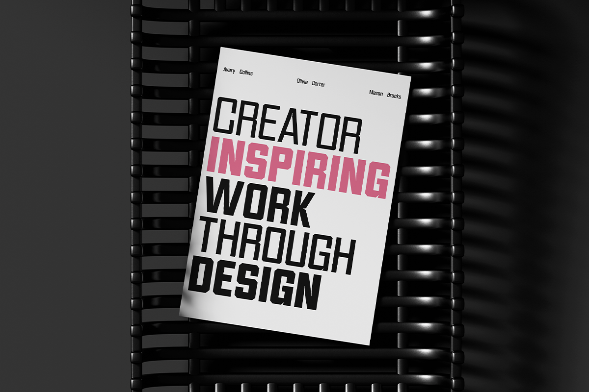 Poster mockup showing bold typography with "Creator Inspiring Work Through Design" text in black with pink accent on dark industrial background