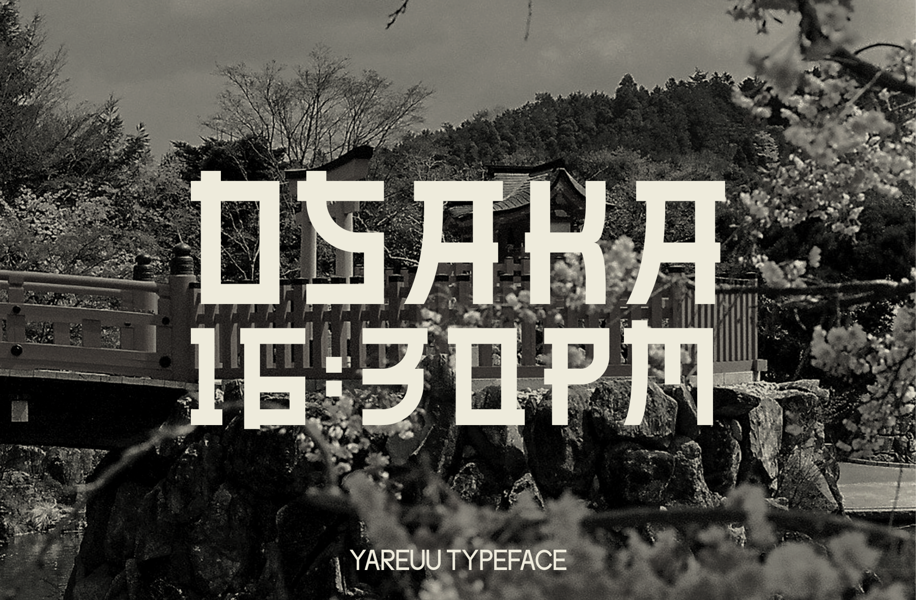 Yareuu typeface overlaid on moody black-white landscape with wooden bridge, trees, stone fence